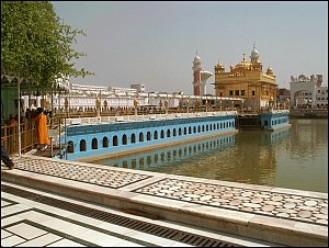 The walkway from the edge of the tank to the temple island is called the guru's bridge.